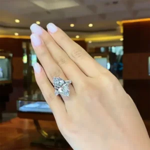 Exceptional GIA Certified 6.11 Carat Marquise Diamond Ring with tapered baguette