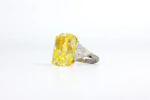 J. Birnbach 20.06 ct GIA Fancy Intense Yellow Cushion Diamond Three-Stone Ring
